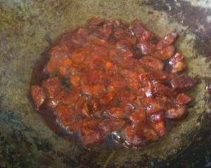chorizo frying in pan