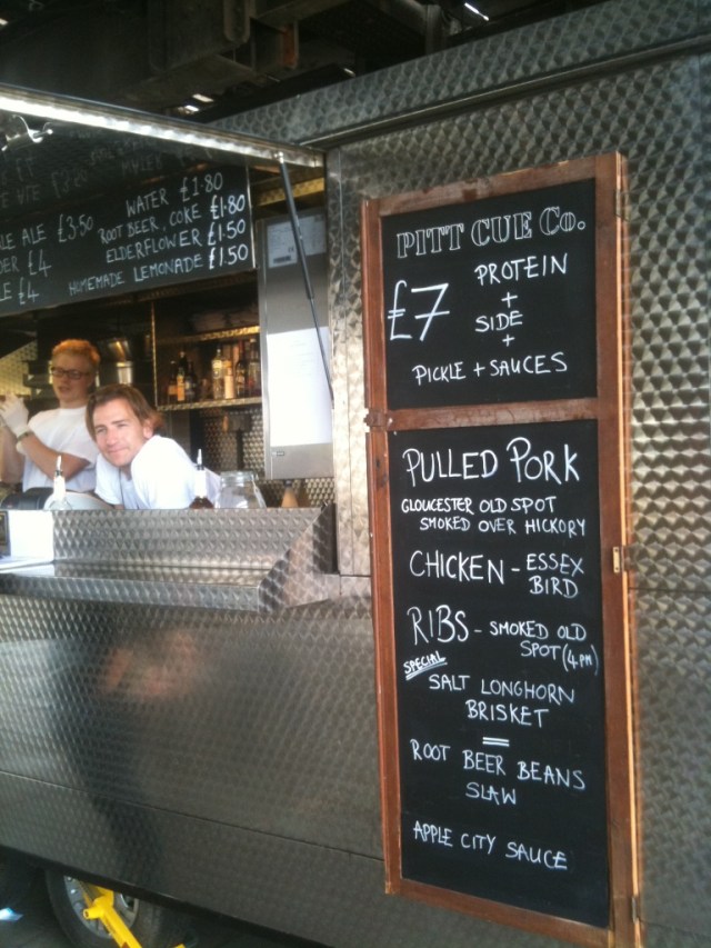 Jamie Berger looks on as we study the Pitt Cue Co Menu