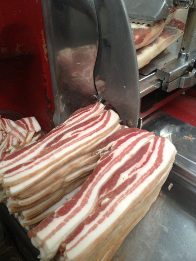 streaky bacon on slicer